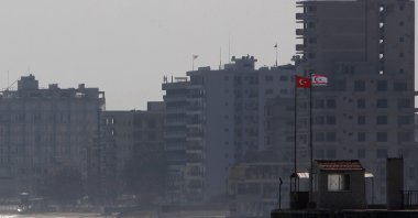 Turkish and Turkish Cypriot flags are seen on a military guard post in Gazimağusa or Famagusta, TRNC, Jan. 17, 2014. (AP Photo)