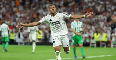 Real Madrid's Kylian Mbappe celebrates scoring his team's second goal during the Spanish league football match between Real Real Madrid and Real Betis at the Santiago Bernabeu Stadium, Madrid, Spain, Sept. 1, 2024. (AFP Photo)