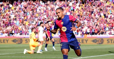 Barcelona's Raphinha celebrates scoring his first goal during the LaLiga match against Real Valladolid at the Estadi Olimpic Lluis Companys, Barcelona, Spain, Aug, 31, 2024. (Reuters Photo)