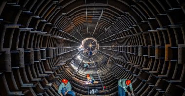 Employees work on a steel tube tower production line at a factory in Haian in eastern Jiangsu province, China, Sept. 1, 2024. (AFP Photo)