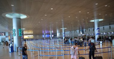 Passengers walk by an empty waiting area at the Ben Gurion International Airport after an Israeli trade union announced a general strike, Tel Aviv, Israel, Sept. 2, 2024. (EPA Photo)