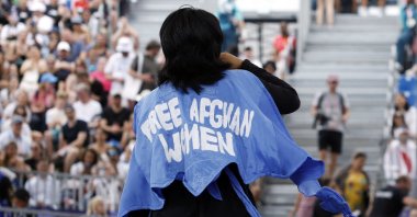 Refugee Olympic team&#039;s Manizha Talash, known as Manizha, wears a jacket reading "Free Afghan women" as she competes in the Women&#039;s Breaking dance qualifying round of the Paris 2024 Olympic Games at La Concorde, Paris, France, Aug. 9, 2024. (AFP Photo)