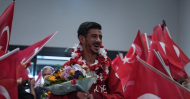 Turkish para-taekwondo athlete Mahmut Bozteke arrives at the Istanbul Airport after winning the 2024 Paris Paralympics gold, Istanbul, Türkiye, Sept. 1, 2024. (AA Photo)
