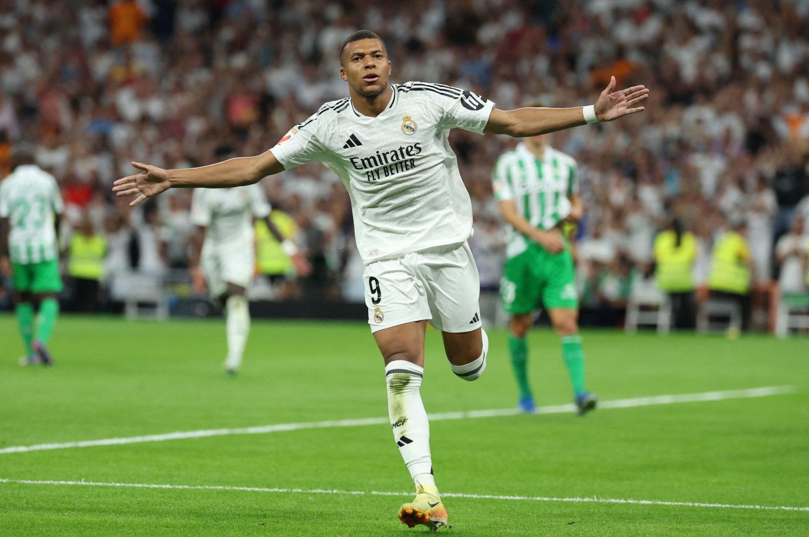 Real Madrid&#039;s Kylian Mbappe celebrates scoring his team&#039;s second goal during the Spanish league football match between Real Real Madrid and Real Betis at the Santiago Bernabeu Stadium, Madrid, Spain, Sept. 1, 2024. (AFP Photo)