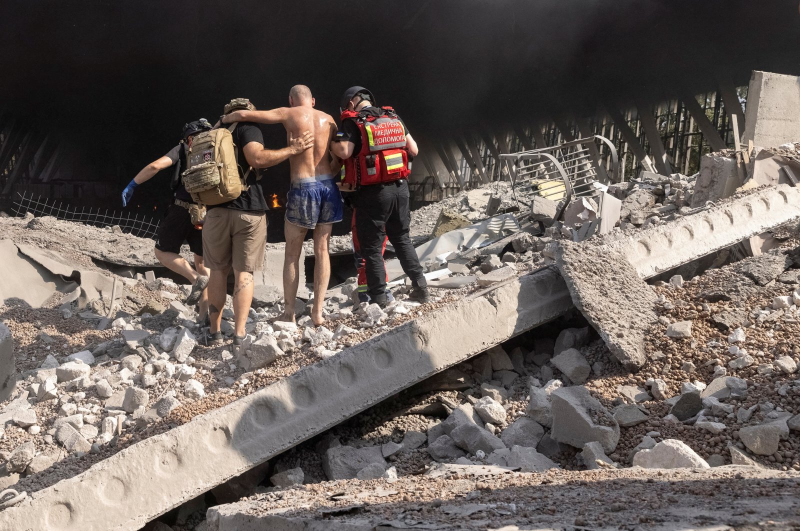 Rescuers extract a survivor at the site of a Russian missile strike, in Kharkiv, Ukraine, Sept. 1, 2024. (Reuters Photo)