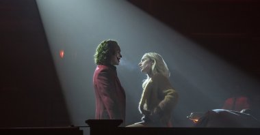 This image released by Warner Bros. Pictures shows Joaquin Phoenix (L) and Lady Gaga in a scene from &quot;Joker: Folie a Deux.&quot; (AP Photo)
