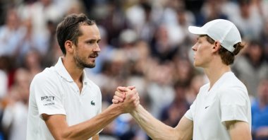 Daniil Medvedev (L) greets Jannik Sinner of Italy after their Men's Singles quarterfinals match during day nine of The Championships Wimbledon 2024 at All England Lawn Tennis and Croquet Club, London, U.K., July 9, 2024. (Getty Images Photo)