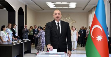 In this photo provided by the Azerbaijan's Presidential Press Office, Azerbaijani President Ilham Aliyev casts his ballot at a polling station during a snap election in the Milli Mejlis parliament in Baku, Azerbaijan, Sunday, Sept. 1, 2024. (Azerbaijani Presidential Press Office via AP)