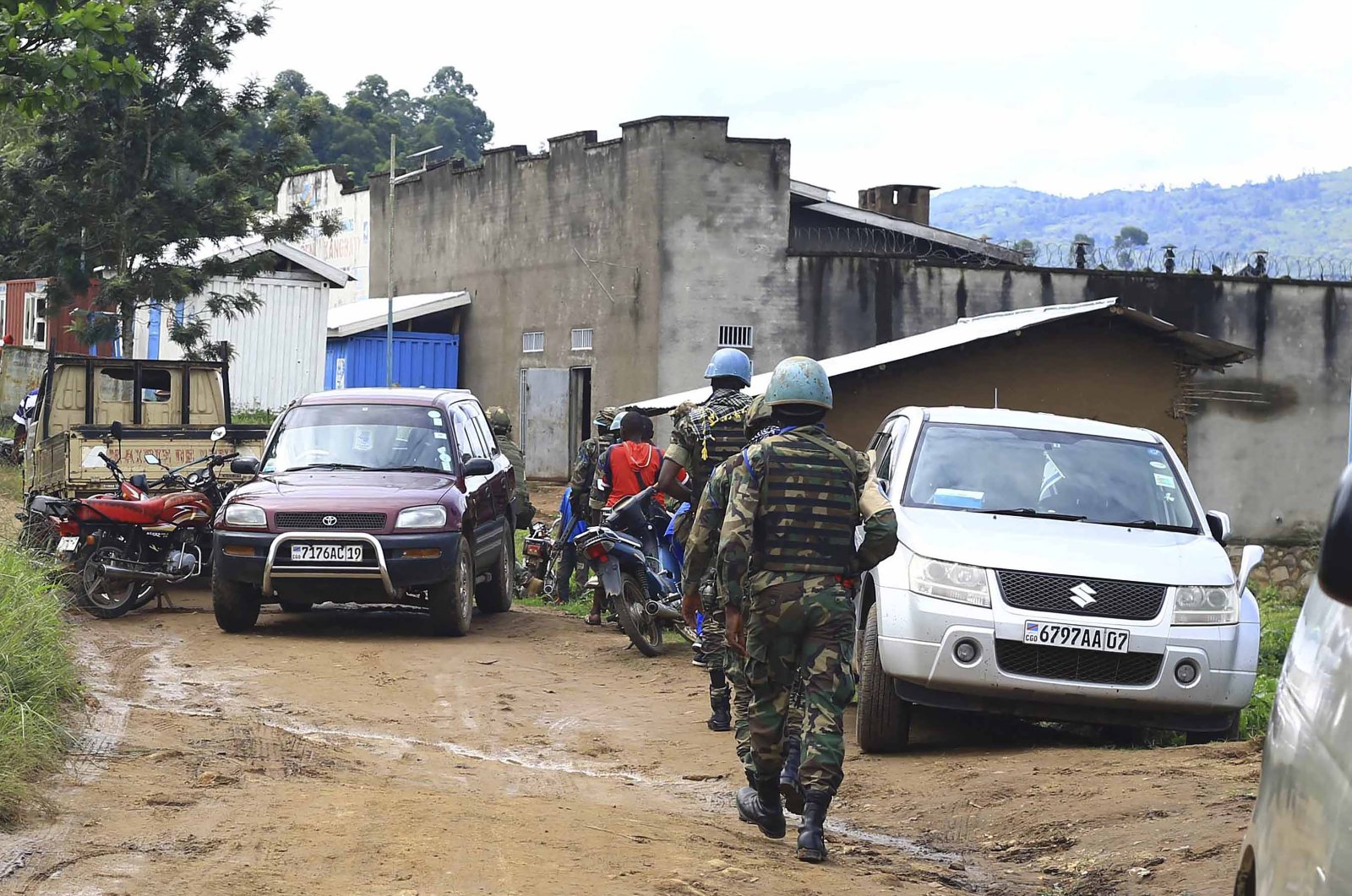 This file photo shows U.N. peacekeepers soldiers patrolling the entrance of a prison in Beni, Congo, Oct. 20. 2020. (AP Photo)