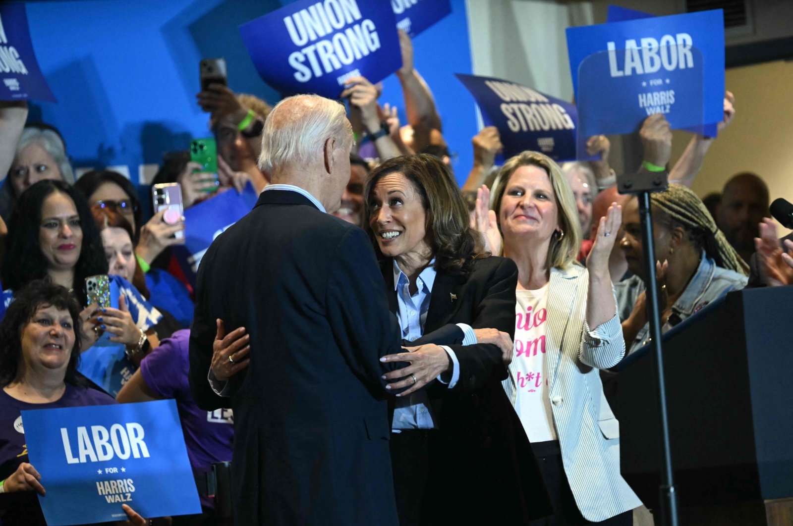 U.S. President Joe Biden (L) embraces Vice President and Democratic presidential candidate Kamala Harris during a campaign rally, in Pittsburgh, Pennsylvania, U.S., Sept. 2, 2024. (AFP Photo)