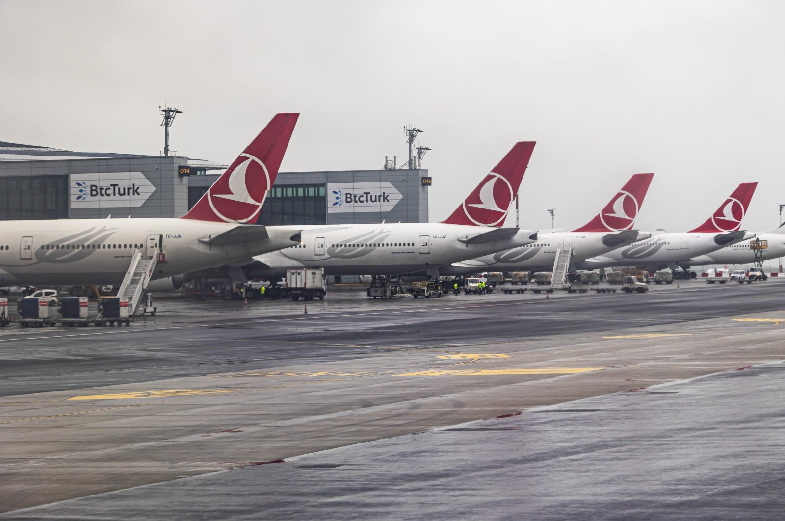 Turkish Airlines wide-body Airbus A330 and Boeing 777 aircraft for long-haul flights are parked in front of the terminal building of Istanbul Grand Airport (IGA), Istanbul, Türkiye, April 28, 2024. (Reuters Photo)