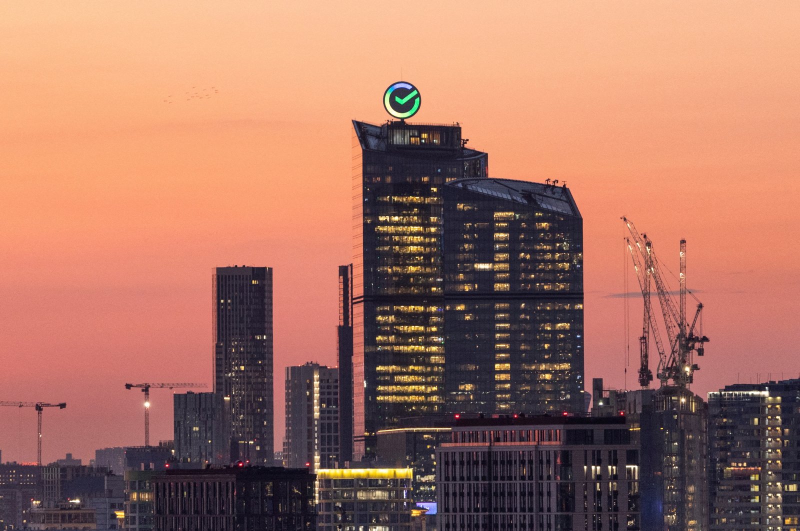 The logo of Russia&#039;s biggest bank Sberbank is seen atop its headquarters in Moscow, Russia, July 24, 2024. (Reuters Photo)