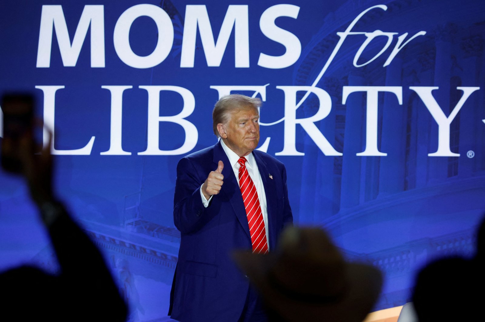 Republican presidential nominee and former U.S. President Donald Trump participates in a fireside chat during the Moms for Liberty National &quot;Joyful Warriors&quot; Summit, in Washington, U.S., Aug. 30, 2024. (Reuters Photo)