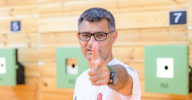 Olympic silver medalist shooter Yusuf Dikeç poses for a photograph, Ankara, Türkiye, Aug. 9, 2024. (AFP Photo)
