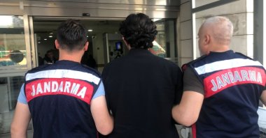 Gendarmerie forces escort a suspected terrorist to the courthouse in southeastern Şanlıurfa province, Türkiye, Oct. 31, 2023. (DHA Photo)