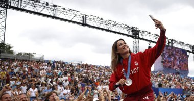 Türkiye's Hatice Akbaş celebrates with her Paris 2024 Olympics women's 54 kg. boxing silver medal during the Champions Park medallist's celebrations, Paris, France, Aug. 9, 2024. (Reuters Photo) 