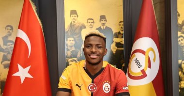 Galatasaray&#039;s new signing, Victor Osimhen, poses for a photo as he signs his contract, Istanbul, Türkiye, Sept. 5, 2024. (IHA Photo)
