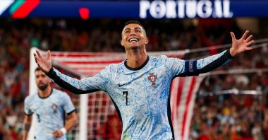 Cristiano Ronaldo of Portugal celebrates scoring their second goal, and his 900th career goal, during the UEFA Nations League Group A football match between Portugal and Croatia, in Lisbon, Portugal, Sept. 5, 2024. (EPA Photo)