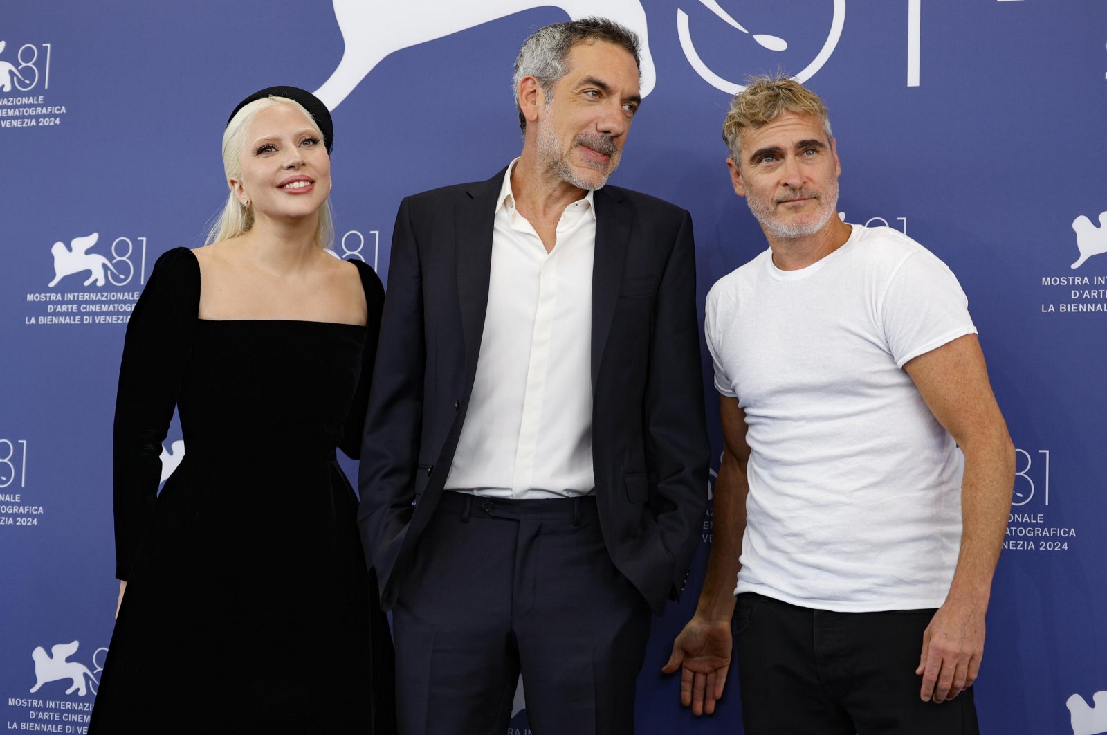 From left, U.S. singer and actor Lady Gaga, U.S. director Todd Phillips and U.S. actor Joaquin Phoenix pose at a photocall for "Joker: Folie a Deux" during the 81st annual Venice International Film Festival, Venice, Italy, Sept. 4, 2024. (EPA Photo)