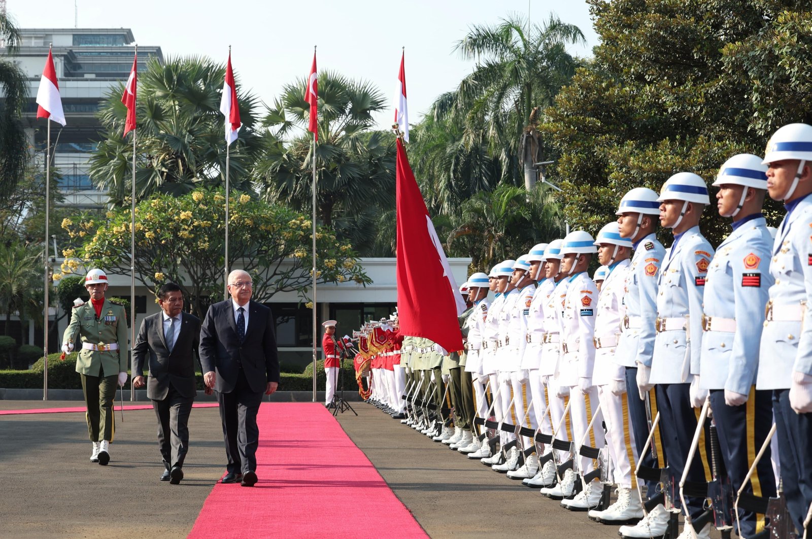 Defense Minister Yaşar Güler (C) is welcomed by Indonesian Defense Minister Prabowo and President-elect Subianto Djojohadikusumo during a military ceremony upon his arrival at the Indonesian Defense Ministry, Jakarta, Indonesia, Aug. 22, 2024. (AA Photo)