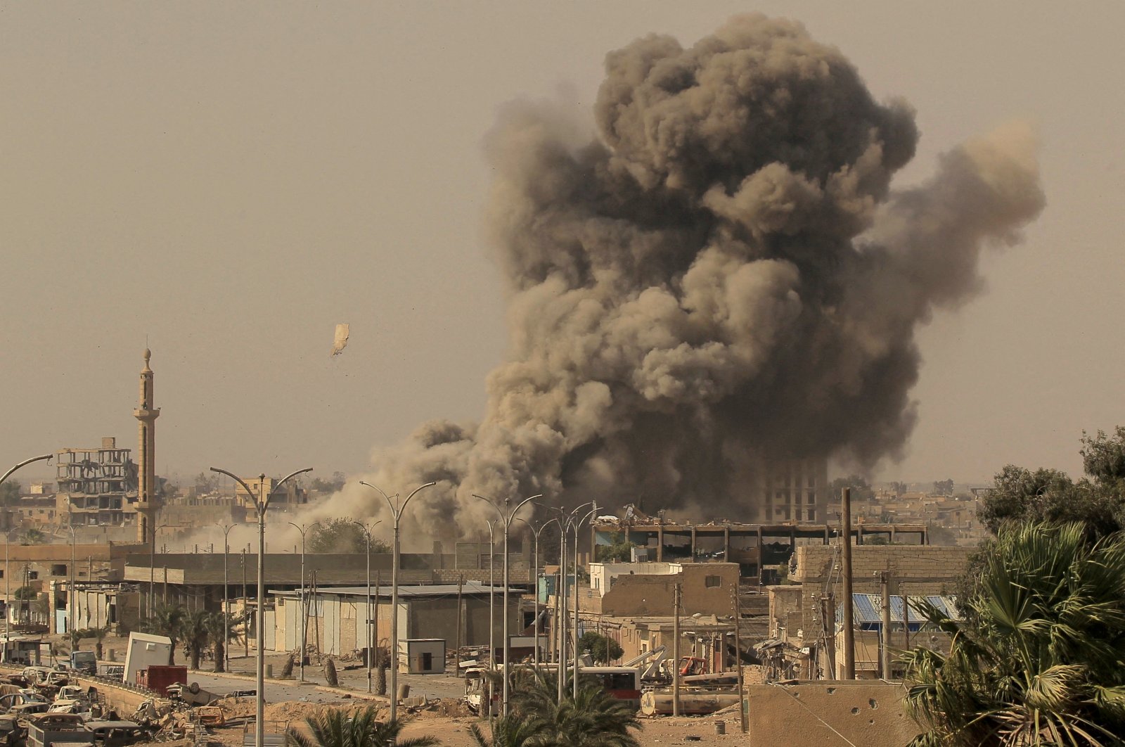 Smoke rises after an airstrike during fighting between PKK/YPG and Daesh terrorists, Raqqa, Syria, Aug.15, 2017. (Reuters Photo)