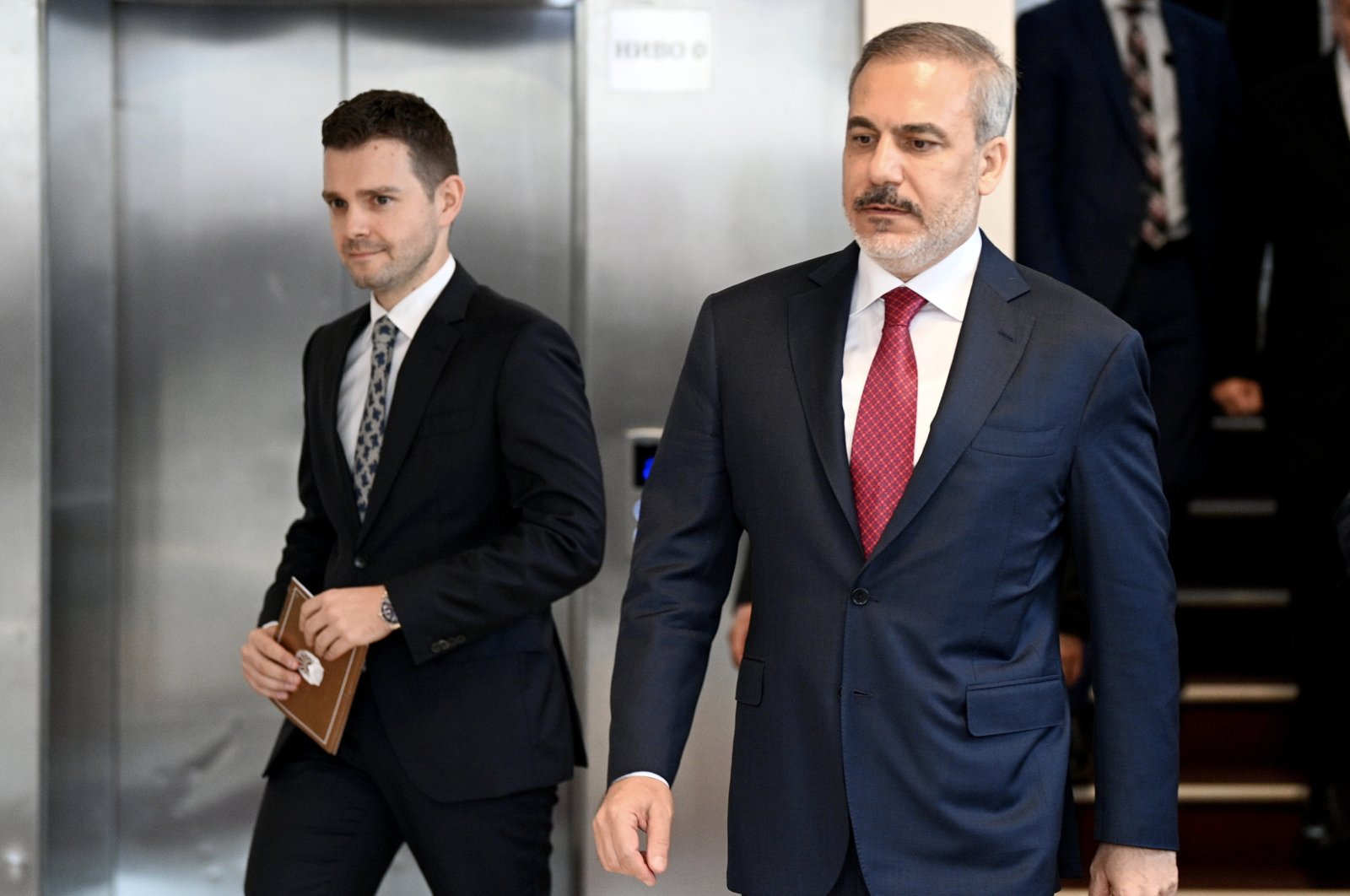 Turkish Foreign Minister Hakan Fidan (R), accompanied by his North Macedonian counterpart Timco Mucunski (L), arrives to attend a joint news conference in Skopje, Republic of North Macedonia, Sept. 5, 2024. (EPA Photo)