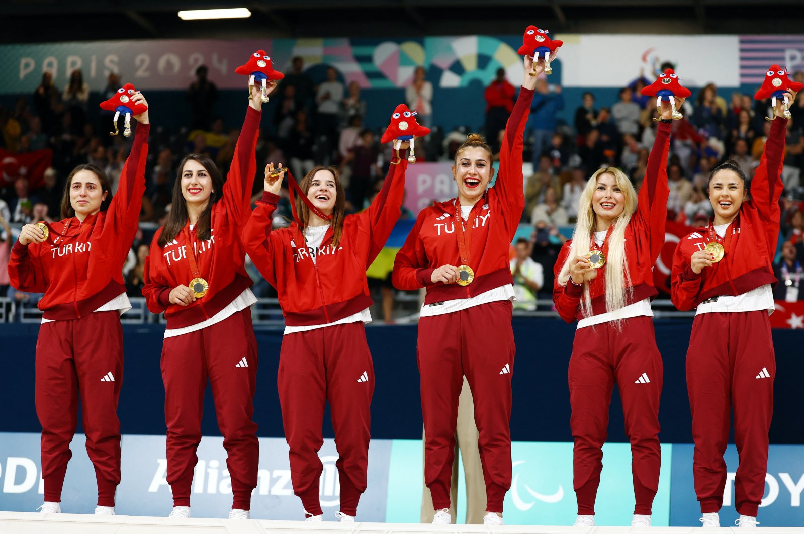 Gold medalists Fatma Gül Güler, Reyhan Yılmaz, Sevda Altunoluk, Seydanur Kaplan, Sevtap Altunoluk and Berfin Altan of Türkiye celebrate on the podium after defeating Israel in the final match in the women&#039;s goalball at the Paralympics in Paris, France, Sept. 5, 2024. (Reuters Photo)