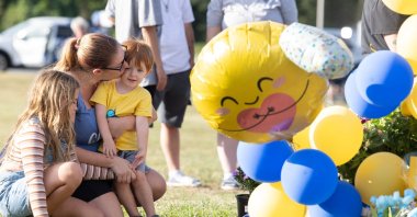 Community members pay their respects at a makeshift memorial outside of Apalachee High School following the school shooting that killed two students and two teachers, Winder, Georgia, U.S., Sept. 5, 2024. (AFP Photo)