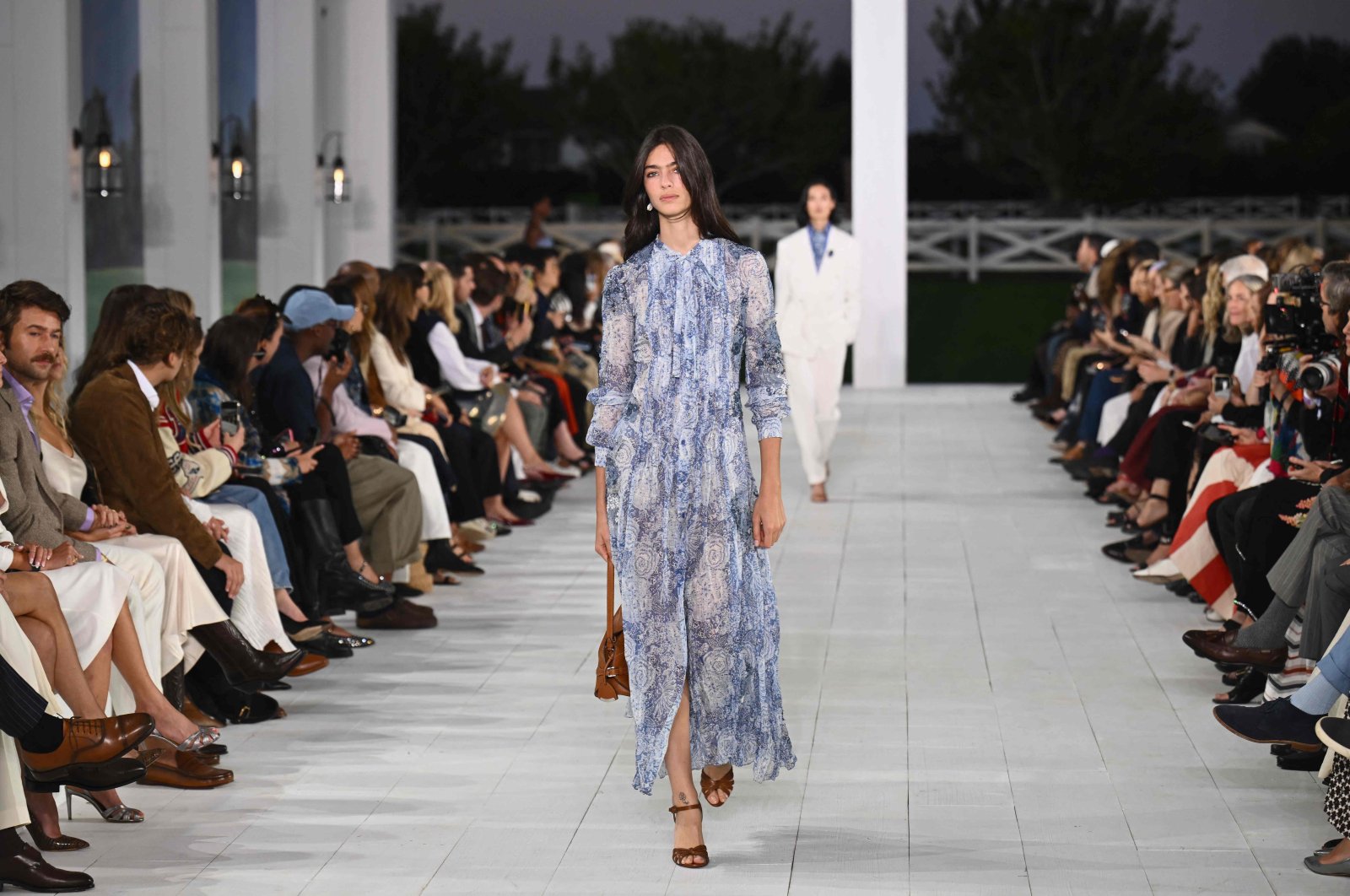 Models walk the runway during the Ralph Lauren Spring/Summer 2025 collection runway show in Bridgehampton, New York, U.S., Sept. 5, 2024. (AFP Photo)