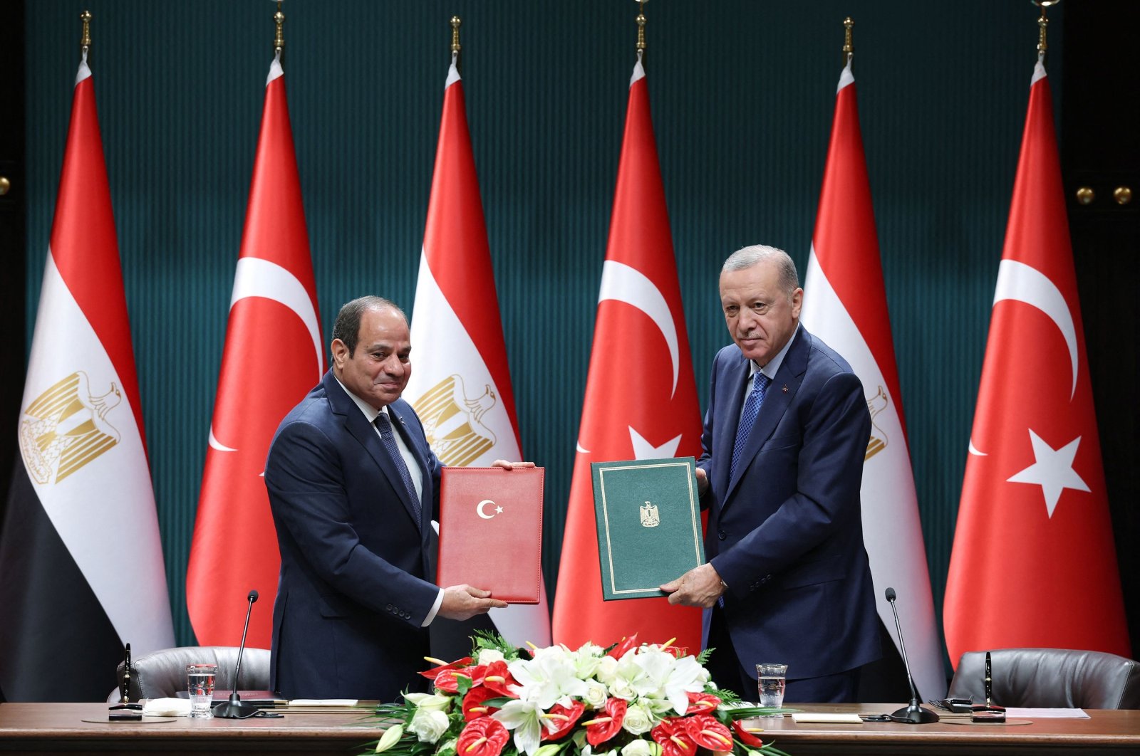 President Recep Tayyip Erdoğan and Egyptian President Abdel-Fattah el-Sissi (L) pose after signing an agreement and before a joint news conference at the Presidential Complex, Ankara, Türkiye, Sept. 4, 2024. (AFP Photo)