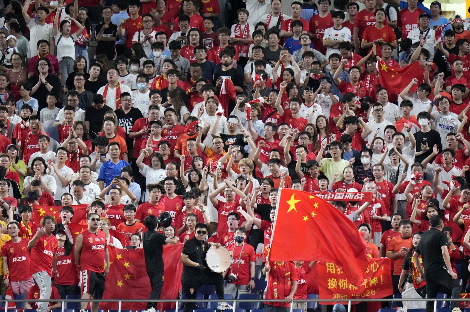 Supporters for the Chinese team cheer during a World Cup and AFC Asian Qualifier between Japan and China at Saitama Stadium 2002, Saitama, Tokyo, Sept. 5, 2024.(AP Photo)