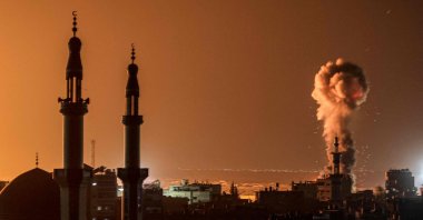 In a photo taken by AFP photographer Mahmud Ham, smoke billows during a deadly Israeli bombardment in Rafah on the southern Gaza Strip, Palestine, Feb. 6, 2024. (AFP Photo)