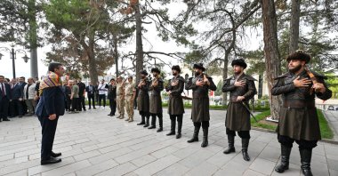 Vice President Cevdet Yılmaz salutes honor guards dressed in Ottoman costumes, in Söğüt, Bilecik, northwestern Türkiye, Sept. 8, 2024. (AA Photo)