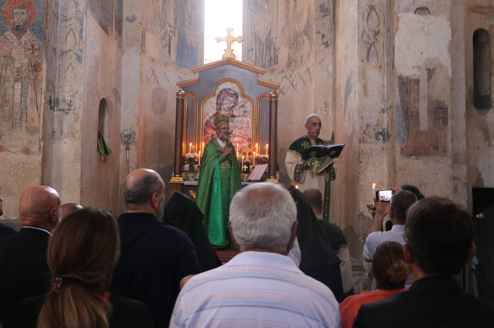 Participants worship inside Akdamar Church, Van, Türkiye, Sept. 8, 2024. (DHA Photo)