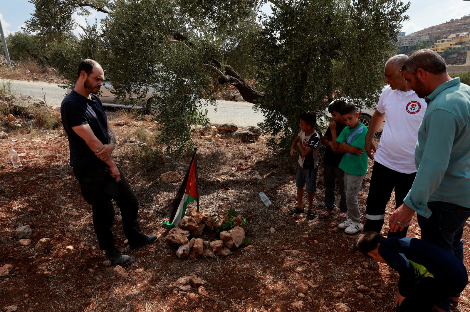 Israeli peace activist Jonathan Pollak stands near the site where Ayşenur Ezgi Eygi was shot, in Beita, West Bank, occupied Palestine, Sept. 7, 2024. (Reuters Photo)