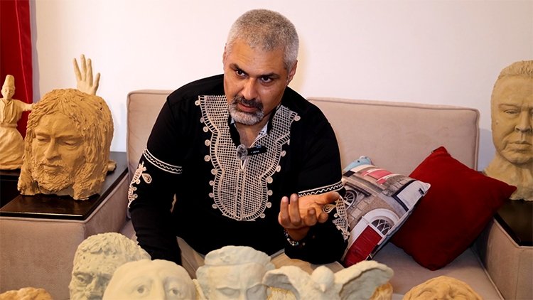 Lebanese sculptor and writer Semir Mansur speaks during an interview, el-Hebbariye, southern Lebanon, Sept. 6, 2024. (AA Photo) 