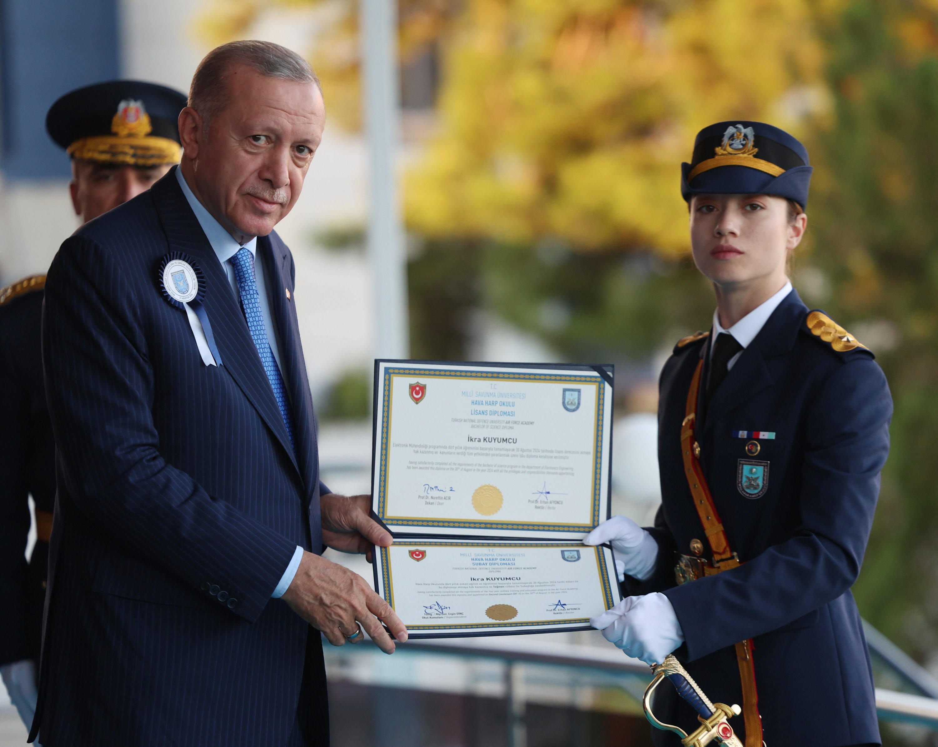 President Recep Tayyip Erdoğan gives a diploma to a top graduate student at a recent Military Academy graduation in the capital of Ankara, Türkiye, Aug. 30, 2024. (AA Photo)