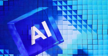 An AI logo, symbolizing machine intelligence and computer systems technologies under the umbrella of Artificial Intelligence is on display at the Mobile World Congress, Barcelona, Spain, Feb. 28, 2024. (Reuters Photo)