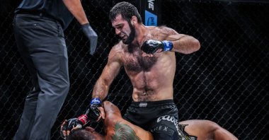 Turkish MMA fighter Shamil Erdoğan pounds on U.S.&#039; Aung La N Sang at the ONE 168, Denver, U.S., Sept. 7, 2024. (Photo by Lara Badreddine)