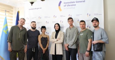 Members of the Cultural Forces group pose for a photo with Daily Sabah news editor Elif Sena Darbaz (C), Istanbul, Türkiye, Sept. 4, 2024. (Photo by Elif Sena Darbaz)