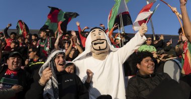 Club Palestino team fans celebrate their victory over Santiago Wanderers at a local league match at La Cisterna stadium, Santiago, Chile, July 12, 2024. (AP Photo)