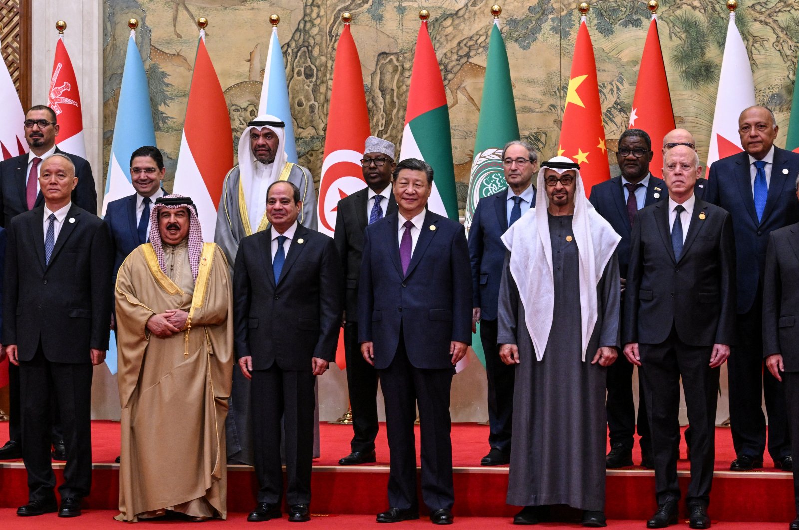 From left to right, China’s Politburo Standing Committee member Cai Qi, Bahrain&#039;s King Hamad bin Isa Al Khalifa, Egypt’s President Abdel-Fattah el-Sissi, China’s President Xi Jinping, United Arab Emirates’ President Sheikh Mohamed bin Zayed Al Nahyan and Tunisia’s President Kais Saied pose for a group photo ahead of the opening ceremony of the 10th Ministerial Meeting of China-Arab States Cooperation Forum at the Diaoyutai State Guesthouse, Beijing, China, May 30, 2024. (Reuters Photo)