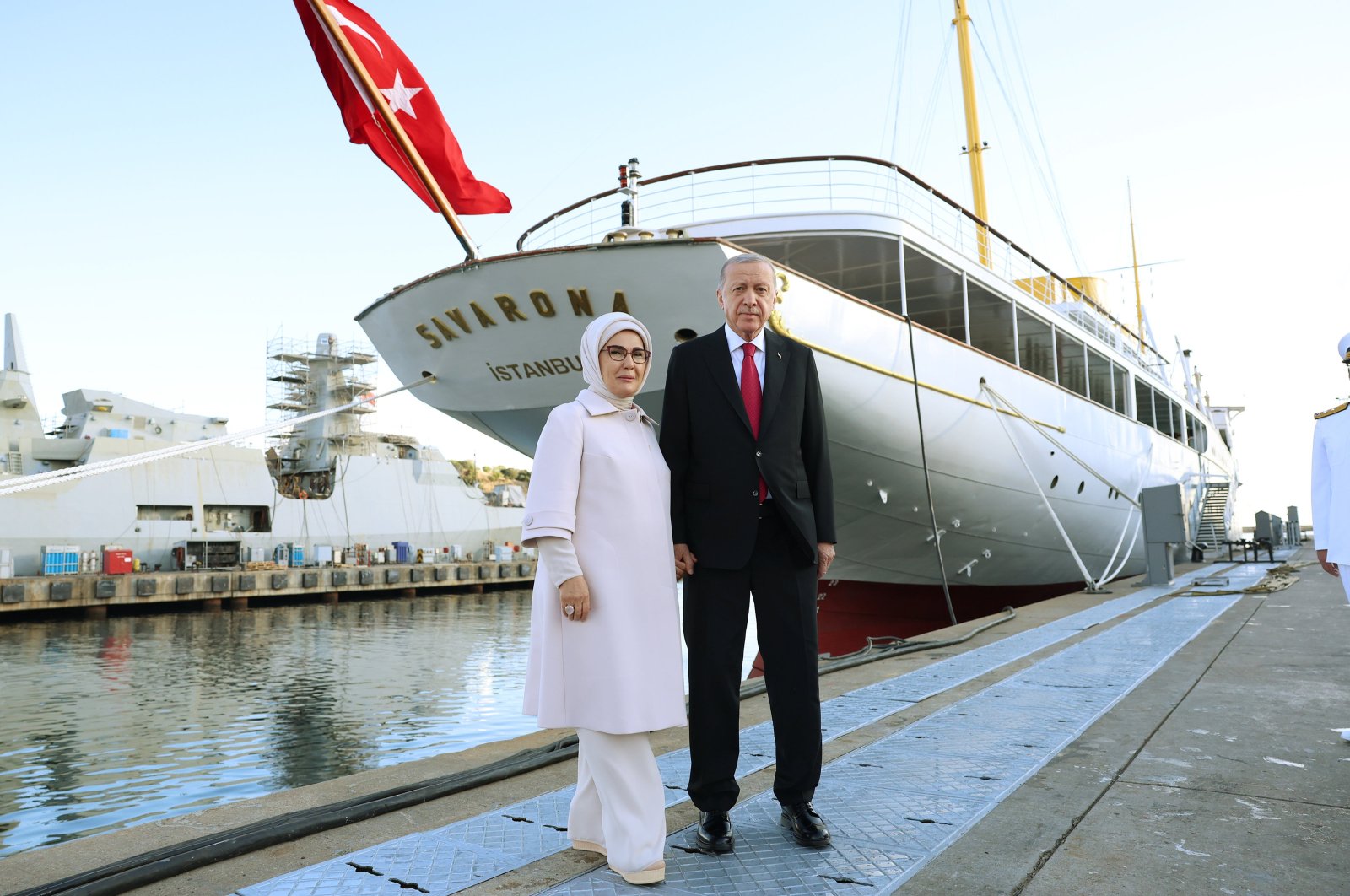 President Recep Tayyip Erdoğan, accompanied by first lady Emine Erdoğan, poses in front of the Savarona yacht, Istanbul, Türkiye, Sept. 8, 2024. (AA Photo)