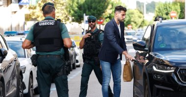 Valencia football player Rafa Mir leaves a Valencia local court after a judge released him with precautionary measures for an alleged crime of sexual assault, Liria, Spain, Sept. 4, 2024. (Reuters Photo)