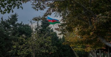 A giant Azerbaijan flag waves in the sky, Baku, Azerbaijan, Nov. 9, 2023. (Getty Images Photo)