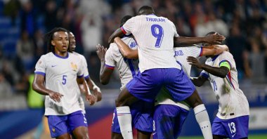 France's Marcus Thuram (C) congratulates Randal Kolo Muani's goal during the UEFA Nations League, League A Group 2 first leg football match between France and Belgium at the Parc Olympique Lyonnais, Lyon, France, Sept. 9, 2024. (AFP Photo)