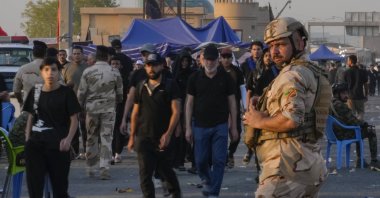 An Iraqi Army soldier stands guard, Baghdad, Iraq, Aug. 22, 2024. (AP Photo)