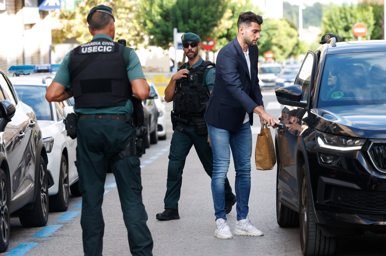 Valencia football player Rafa Mir leaves a Valencia local court after a judge released him with precautionary measures for an alleged crime of sexual assault, Liria, Spain, Sept. 4, 2024. (Reuters Photo)