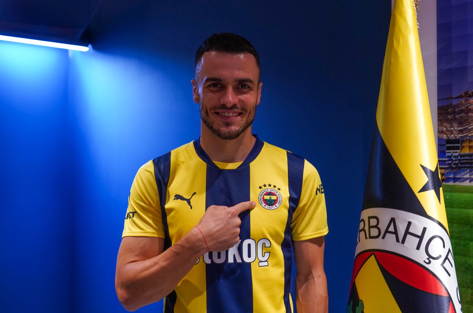 Fenerbahçe&#039;s Filip Kostic poses for a photo after signing his contract, Istanbul, Türkiye, Sept. 9, 2024. (DHA Photo)