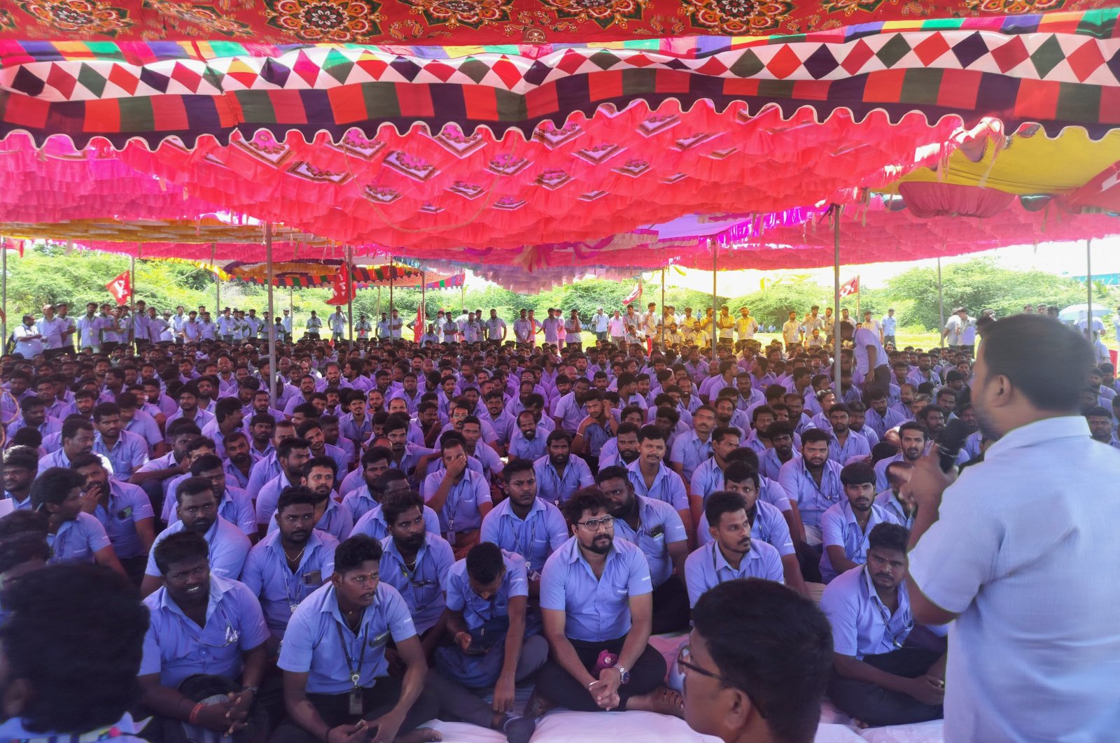 Workers of a Samsung facility listen to a speaker during a strike to demand higher wages at its Sriperumbudur plant near the city of Chennai, India, Sept. 10, 2024. (Reuters Photo)